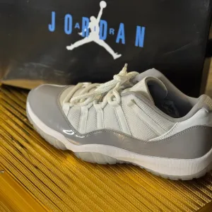 Air Jordan Men's Low Cement Gray Sneakers