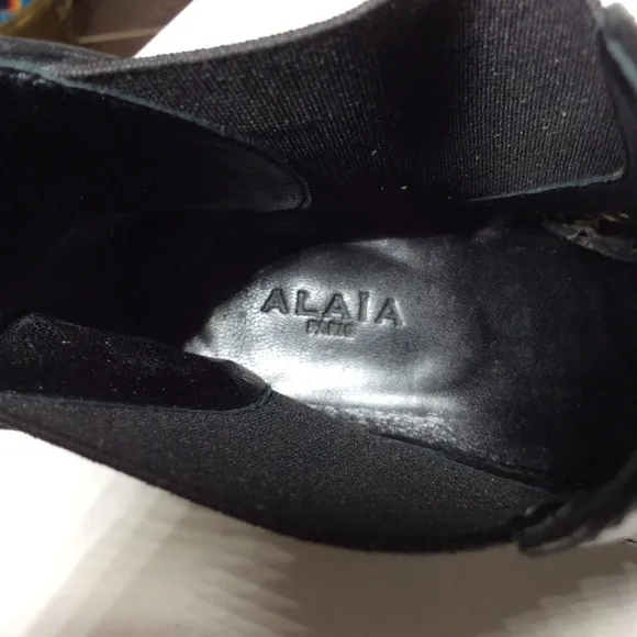 Alaia Laser Cut Black Leather Ankle Boots