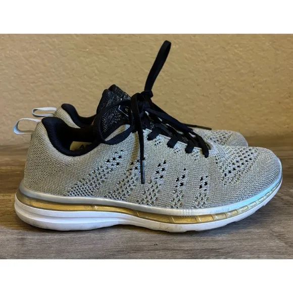 APL Techloom Pro Sneakers Metallic Gold Silver Knit Womens Running Shoes