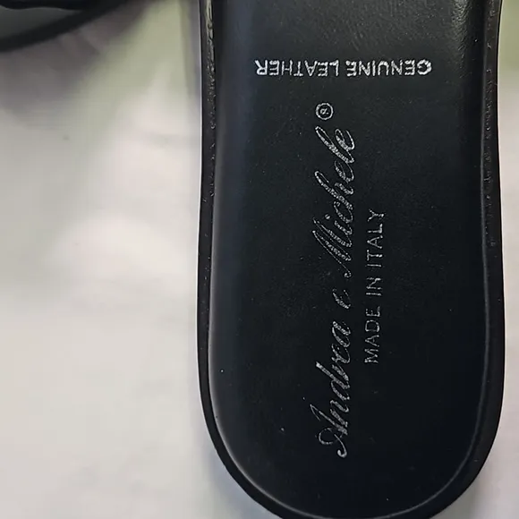 Black Leather Sandals with Tortoise Buckle