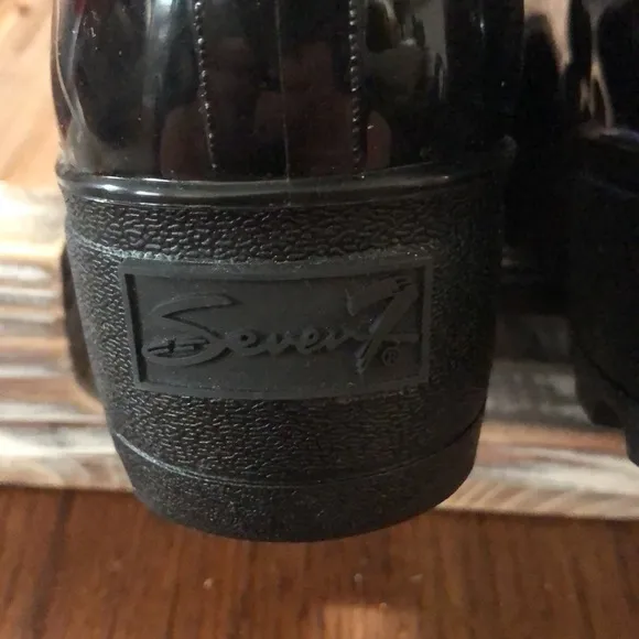 Black seven 7 ankle rain boots, never worn.  Excellent condition.