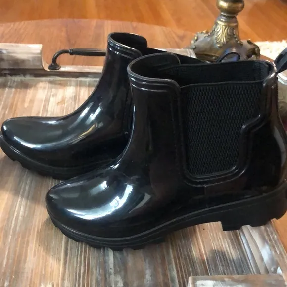 Black seven 7 ankle rain boots, never worn.  Excellent condition.