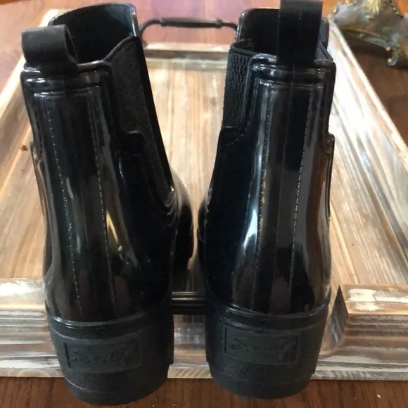 Black seven 7 ankle rain boots, never worn.  Excellent condition.