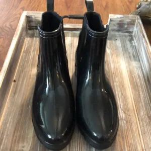Black seven 7 ankle rain boots, never worn.  Excellent condition.