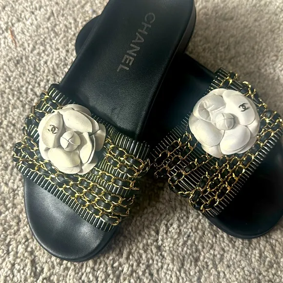 Chanel Black Slide Sandals with White Flower Accent