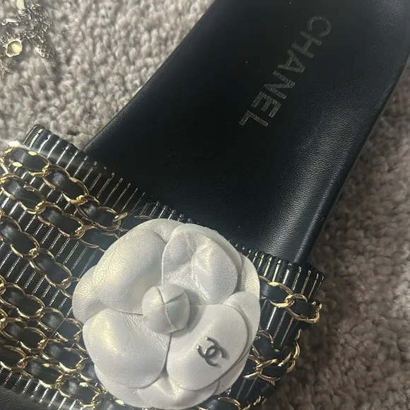 Chanel Black Slide Sandals with White Flower Accent