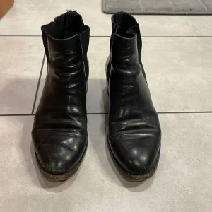 Cole Haan woman’s black ankle boots