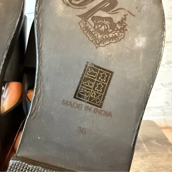 Free People Black Sandals with Cross-Strap Design