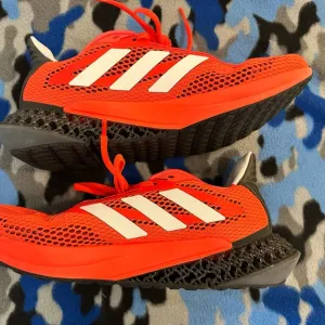 Men’s size 9 1/2 Adidas Ultra 4 D Bright Orange Running Shoes