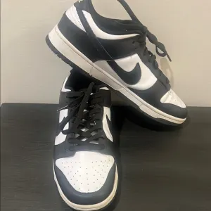 Nike Dunk Men's Black and White Sneakers