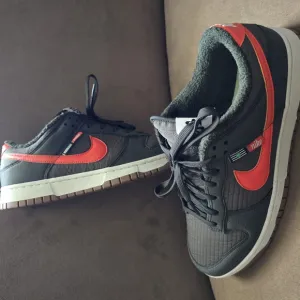 Nike Green and Orange  Sneakers with Classic Low-Top Design