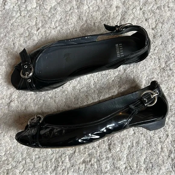 STUART WEITZMAN: Black Leather Silver Buckle Detail Cutout Accent Ballet Flats